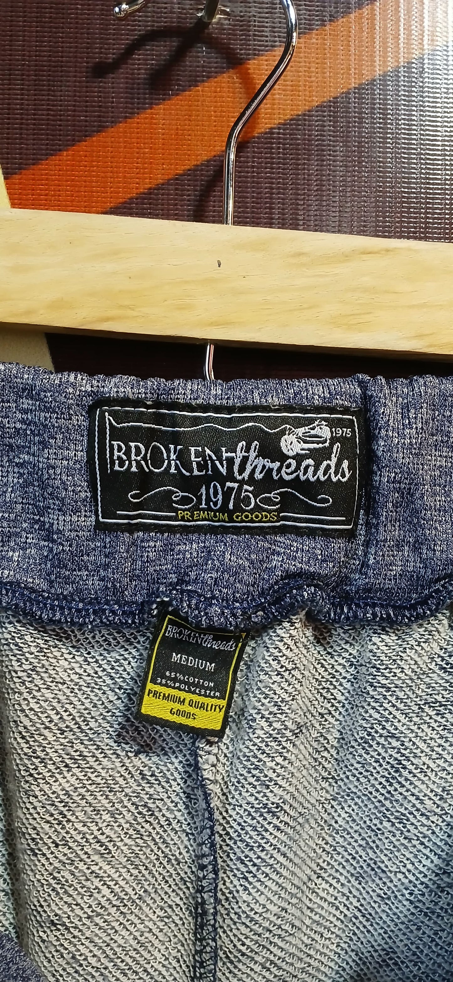 IMPORTED SHORT BY BROKEN THREADS